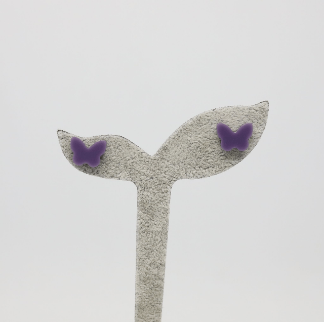 Puces d'oreilles Papillons